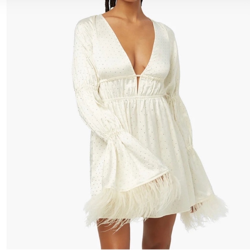 WEWOREWHAT rhinestone bell sleeved mini dress with feathers